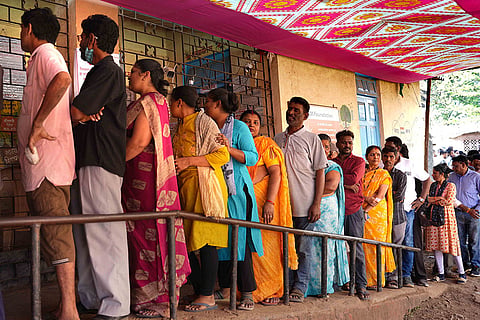 Voters in line waiting for their turn during the Maharashtra civic elections