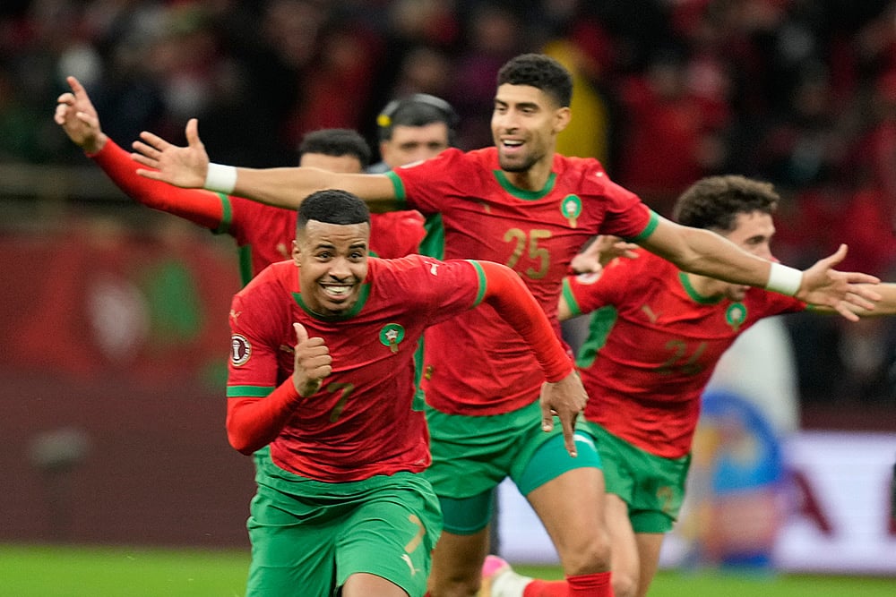 | Photo: AP/Mosa'ab Elshamy : Morocco players celebrate after winning after a penalty shootout during the Africa Cup of Nations semi-final match between Nigeria and Morocco in Rabat, Morocco.