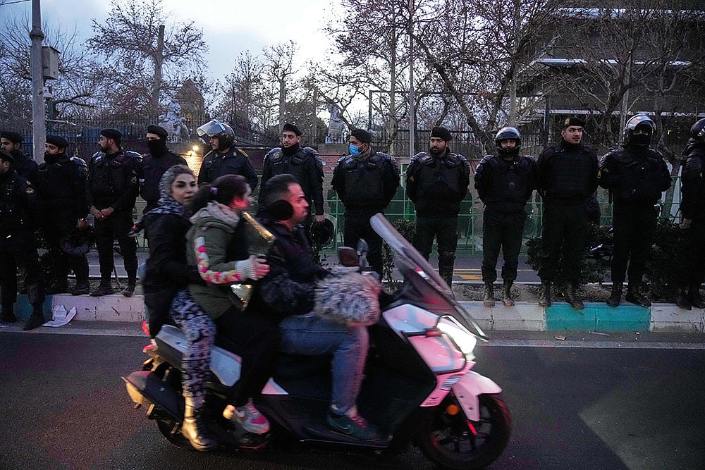 Iran Protests -Policemen protect the British Embassy in Tehran