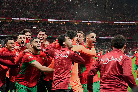 Morocco players celebrate after winning after a penalty shootout during the Africa Cup of Nations semi-final match between Nigeria and Morocco in Rabat, Morocco.