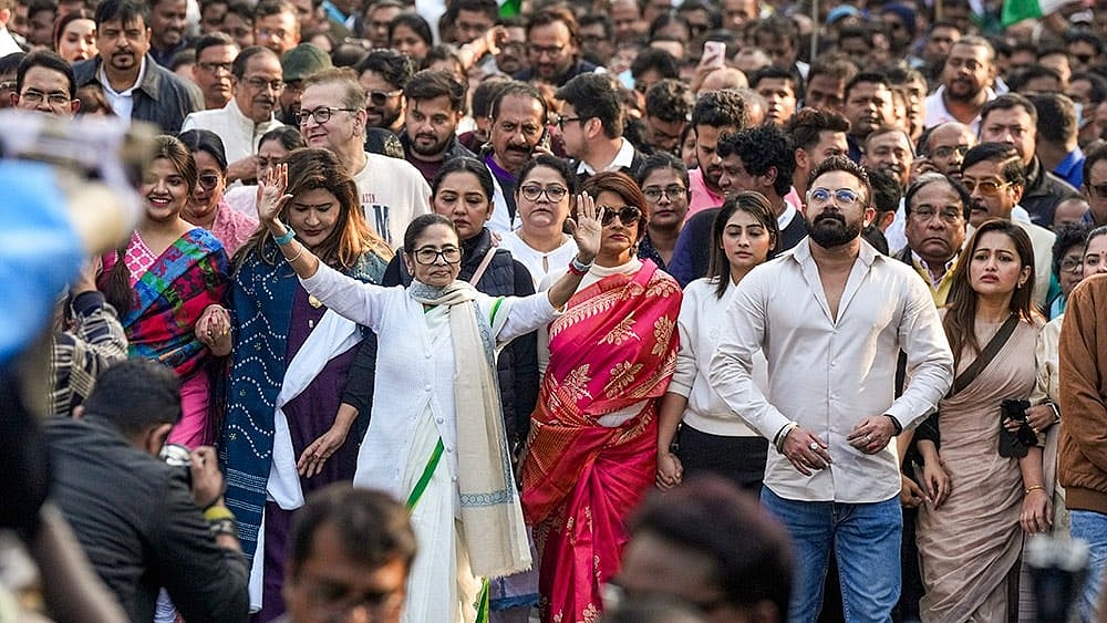 Trinamool Congress (TMC) chief Mamata Banerjee leads a protest march  - Photo: PTI/Swapan Mahapatra