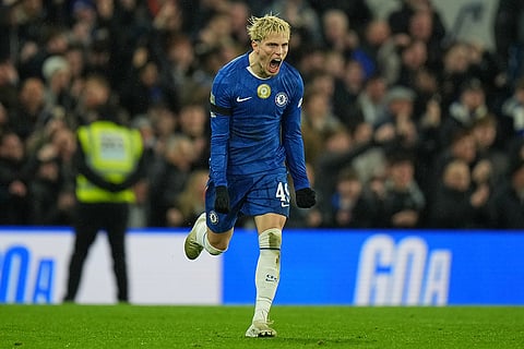 Chelsea's Alejandro Garnacho celebrates after scoring his side's second goal during the English League Cup semifinal first leg soccer match between Chelsea and Arsenal in London.