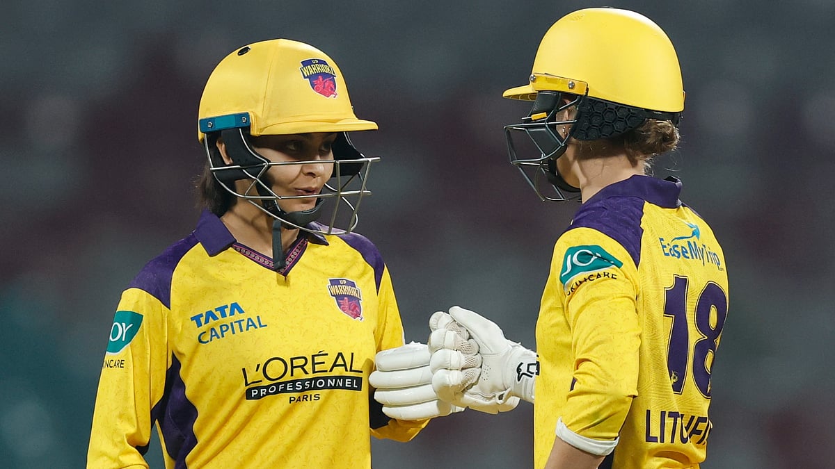 | Photo: X/wplt20 : UP Warriorz's Harleen Deol and Phoebe Litchfield in action during the Women's Premier League match against Mumbai Indians on January 15, 2026.