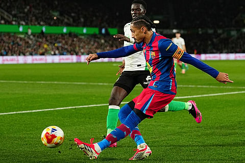 Barcelona's Raphinha tries a shot during the Copa del Rey round of 16 soccer match between Racing Santander and Barcelona, in Santander, Spain, Thursday, Jan. 15, 2026. ()
