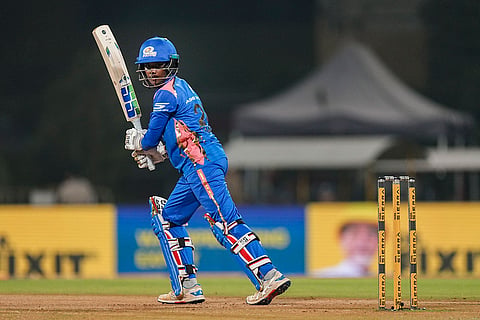 Navi Mumbai: Mumbai Indians' Gunalan Kamalini plays a shot during the Women's Premier League (WPL) 2026 T20 cricket match between Mumbai Indians and UP Warriorz, at the DY Patil Stadium, in Navi Mumbai.