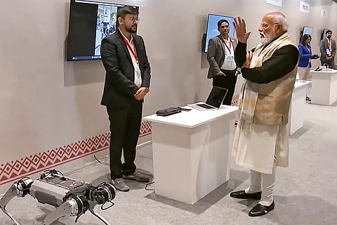 Prime Minister Narendra Modi visits an exhibition during a programme marking a decade of the Startup India initiative, in New Delhi. 