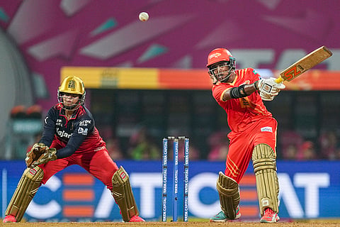 Gujarat Giants' Bharti Fulmali plays a shot during the Women's Premier League (WPL) T20 cricket match between Royal Challengers Bengaluru and Gujarat Giants, at the DY Patil Stadium, in Navi Mumbai.