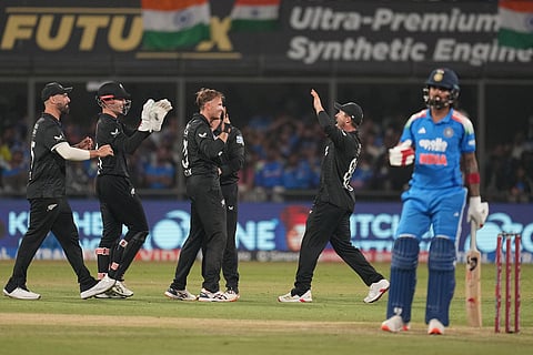 New Zealand's players celebrate the wicket of India's KL Rahul, right, during the third One Day International cricket match between India and New Zealand in Indore, India.
