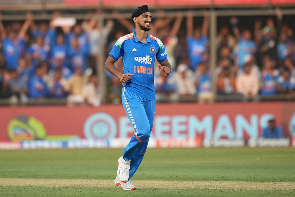 Indias Arshdeep Singh celebrates the wicket of New Zealands Zak Foulkes 