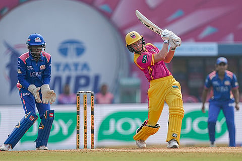UP Warriorz's captain Meg Lanning plays a shot during the Women's Premier League (WPL) T20 cricket match between Mumbai Indians and UP Warriorz, at the DY Patil Stadium, in Navi Mumbai.