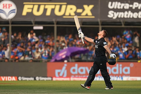 New Zealand's Glenn Phillips celebrates his century during the third One Day International cricket match between India and New Zealand in Indore, India.