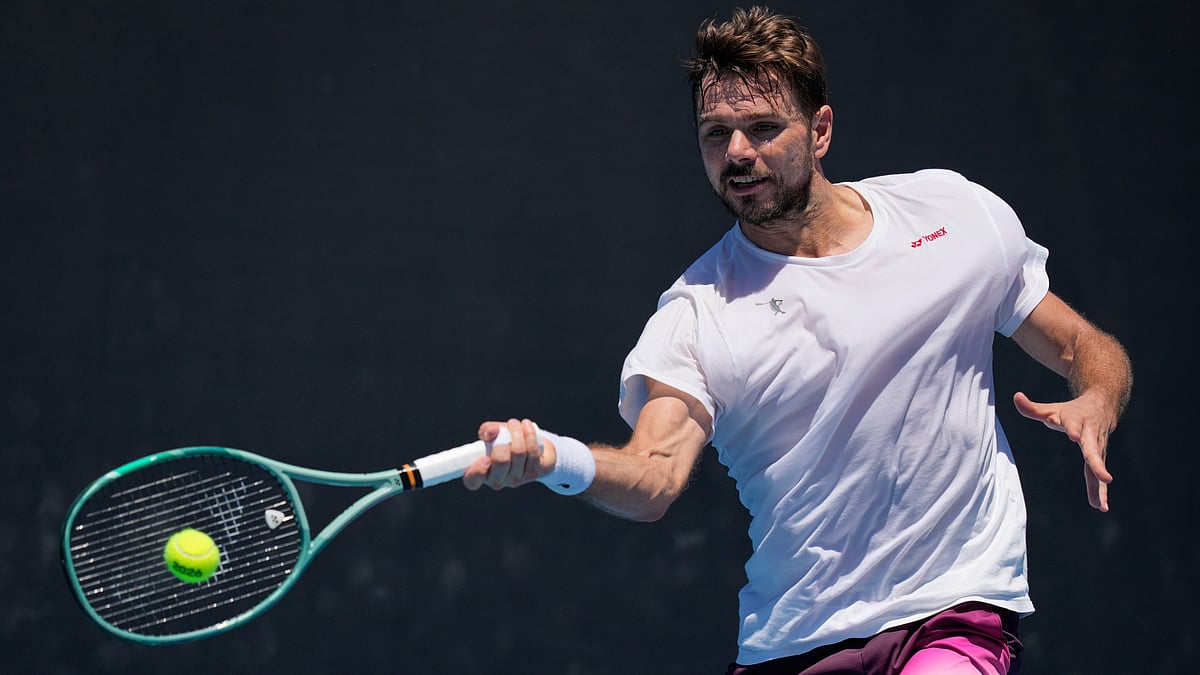 AP Photo/Aaron Favila : Stan Wawrinka of Switzerland plays a forehand return during a practice session, ahead of the Australian Open tennis championship in Melbourne, Australia, Saturday, Jan. 17, 2026. 