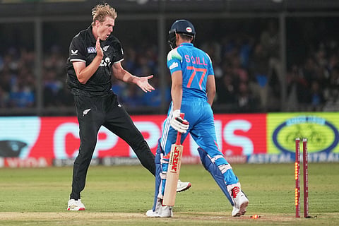 New Zealand's Kyle Jamieson celebrates the wicket of India's captain Shubman Gill, right, during the third One Day International cricket match between India and New Zealand in Indore, India.