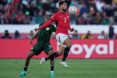 Egypt's Khaled Sobhi and Nigeria's Samuel Chukwueze compete for the ball during the Africa Cup of Nations third place game between Egypt and Nigeria in Casablanca, Morocco.