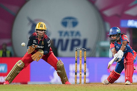 Delhi Capitals' Niki Prasad plays a shot during the Women's Premier League (WPL) T20 cricket match between Royal Challengers Bengaluru and Delhi Capitals, at the DY Patil Stadium, in Navi Mumbai.