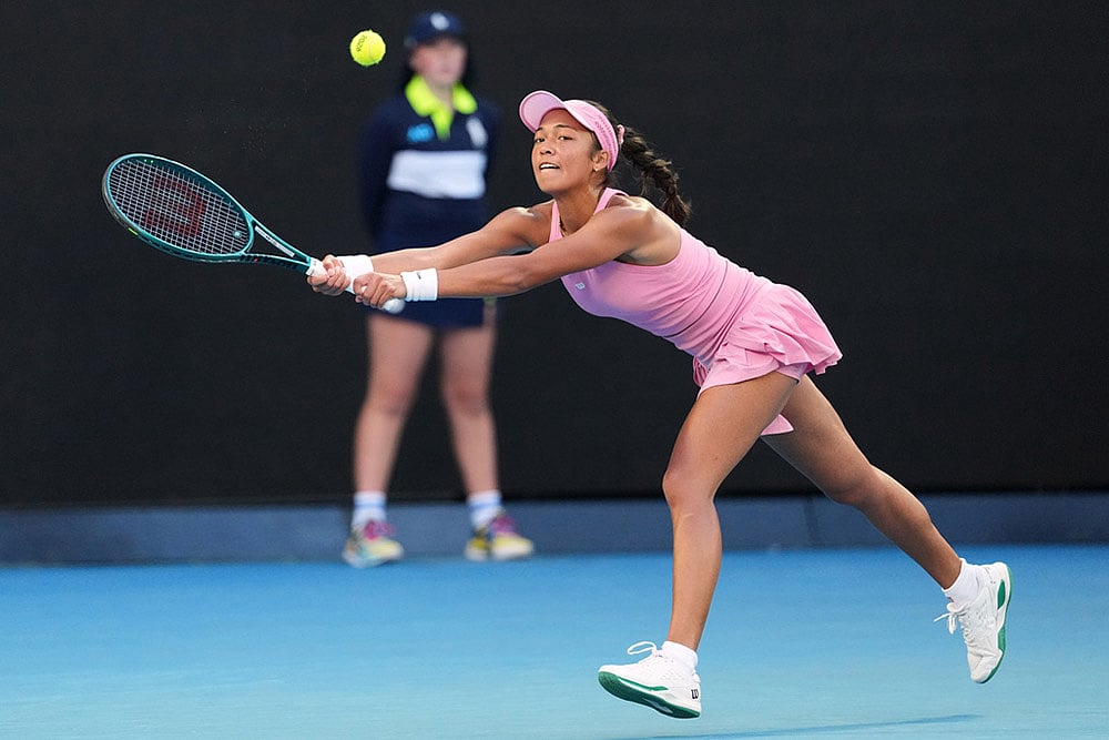 Tiantsoa Rakotomanga Rajaonah of France plays a backhand return to Aryna Sabalenka of Belarus