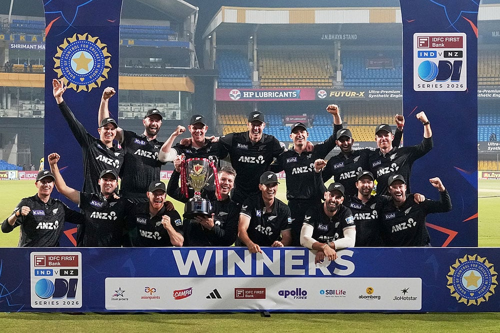 New Zealand's players pose with the trophy after winning the One Day International cricket series against India in Indore, India. - Photo: AP/Rafiq Maqbool