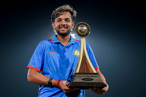 Vidarbha's captain Harsh Dubey poses with the trophy after Vidarbha won the Vijay Hazare Trophy 2025-26, at BCCI Centre of Excellence, in Bengaluru, Karnataka.