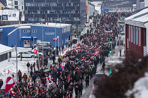 A crowd walks to the US consulate to protest against Trump's policy towards Greenland in Nuuk, Greenland.