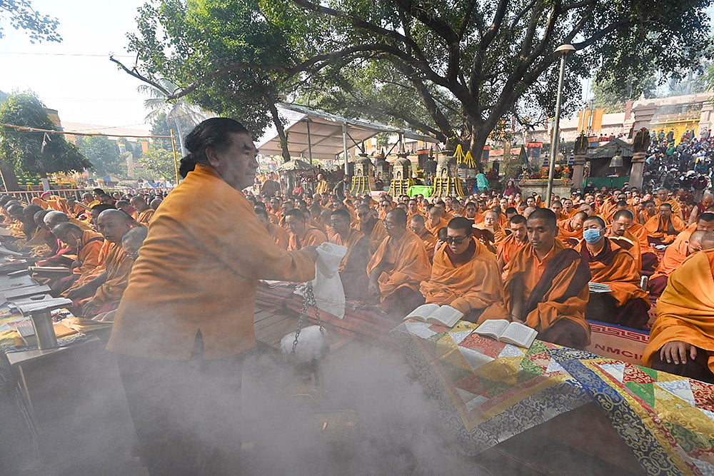 | Photo: PTI : Buddhist monks participate in the 37th Nyingma Monlam Chenmo (World Peace Prayers) at the Mahabodhi Temple, in Bodh Gaya, Bihar.