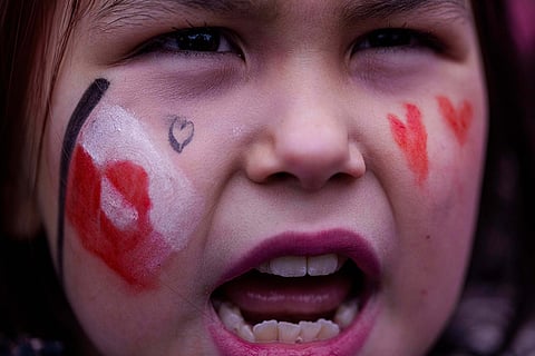 A girl shouts during protest against Trump's policy towards Greenland in front of the US consulate in Nuuk, Greenland.