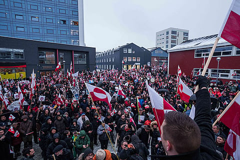 A crowd walk to the US consulate to protest against Trump's policy towards Greenland in Nuuk, Greenland.