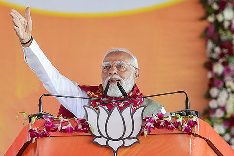 In this image posted on Jan. 18, 2026, Prime Minister Narendra Modi addresses a public meeting, at Singur, in Hooghly district, West Bengal. PM Modi launched development projects worth over Rs 830 crore in West Bengal and flagged off three Amrit Bharat trains connecting Kolkata with other parts of the country.