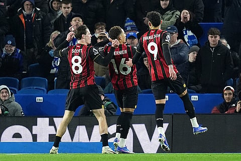 Bournemouth's Marcus Tavernier, centre, celebrates after scoring the opening goal during the English Premier League match between Brighton & Hove Albion and AFC Bournemouth in Brighton and Hove, England.