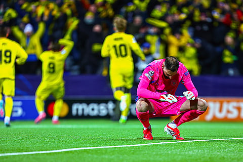 Manchester City goalkeeper Gianluigi Donnarumma after letting in a goal during the Champions League soccer match between Bodo/Glimt and Manchester City in Bodo, Norway.