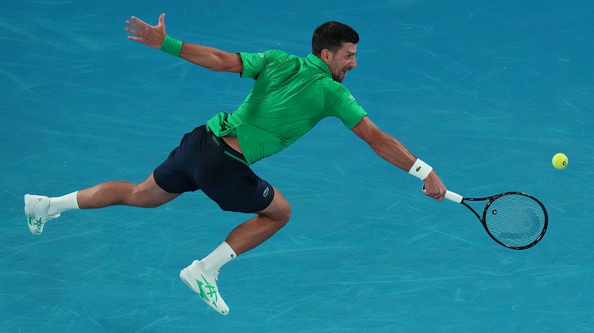 | Photo: AP/Aaron Favila : Novak Djokovic of Serbia plays a backhand return to Pedro Martinez of Spain during their first round match at the Australian Open tennis championship in Melbourne, Australia, Monday, Jan. 19, 2026.