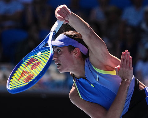 Olga Danilovic of Serbia serves to Coco Gauff of the U.S. during their second round match at the Australian Open tennis championship in Melbourne, Australia.