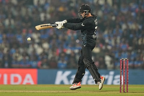 New Zealand's captain Mitchel Santner plays a shot during the first T20 cricket match between India and New Zealand in Nagpur, India.