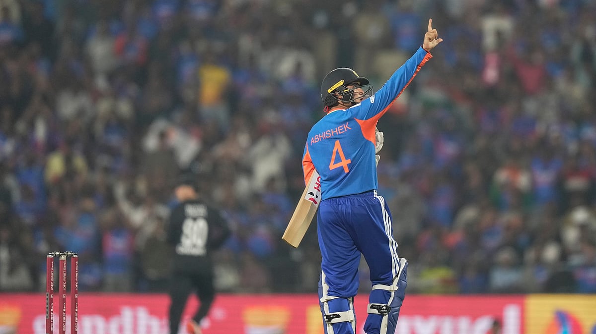 (AP Photo/Mahesh Kumar A.) : India's Abhishek Sharma celebrates after scoring fifty runs during the first T20 cricket match between India and New Zealand in Nagpur, India, Wednesday, Jan. 21, 2026.