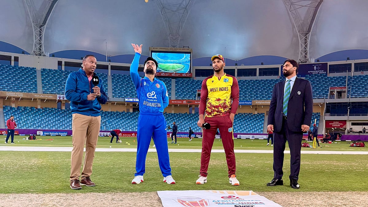 @windiescricket/X : Rashid Khan and Brandon King at AFG vs WI 2nd T20I Toss 