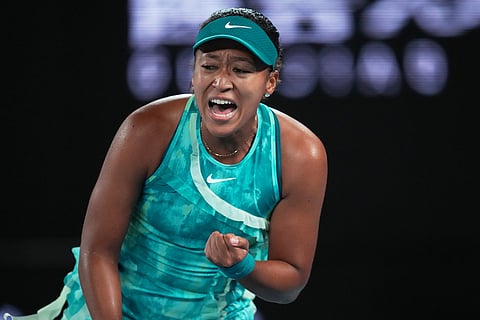 Naomi Osaka of Japan reacts during her first round match against Antonia Ruzic of Croatia at the Australian Open tennis championship in Melbourne, Australia.