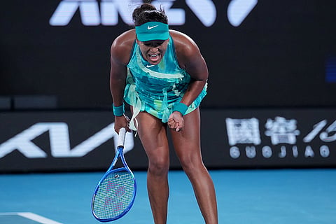 Naomi Osaka of Japan reacts after defeating Sorana Cirstea of Romania in their second round match at the Australian Open tennis championship in Melbourne, Australia.