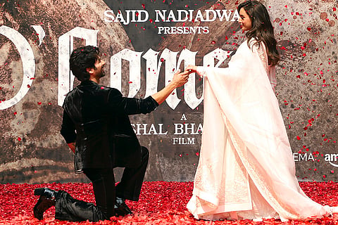 Bollywood actors Shahid Kapoor and Tripti Dimri during the poster launch of their upcoming film O'Romeo, in Mumbai.