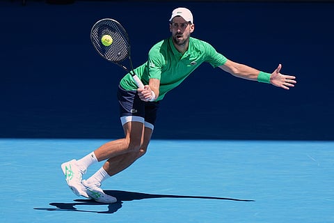 Novak Djokovic of Serbia plays a forehand return to Francesco Maestrelli of Italy during their second round match at the Australian Open tennis championship in Melbourne, Australia.