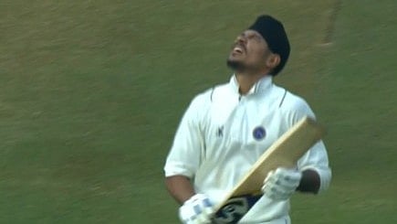 BCCIdomestic/X
 : Sharandeep Singh celebrates after scoring century in Jharkhand vs Uttar Pradesh Ranji Trophy 2025-26 Round 6 match