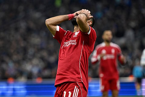 Liverpool's Mohamed Salah reacts during the Champions League opening phase soccer match between Marseille and Liverpool in Marseille, France.