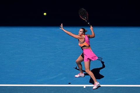 Aryna Sabalenka of Belarus plays a forehand return to Anastasia Potapova of Austria during their third round match at the Australian Open tennis championship in Melbourne, Australia.
