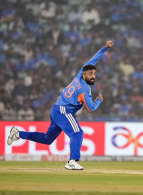 India's Varun Chakravarthy bowls during the second T20I cricket match between India and New Zealand, at Shaheed Veer Narayan Singh International Cricket Stadium, in Raipur, Chhattisgarh.