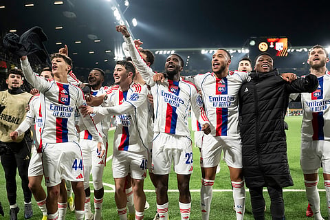Lyon's players celebrate after the Europa League opening phase soccer match between Young Boys and Olympique Lyonnais, in Bern, Switzerland.