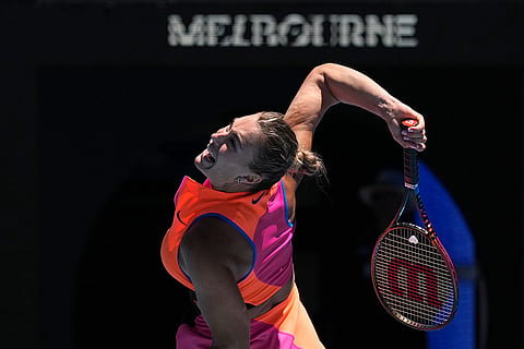 Aryna Sabalenka of Belarus serves to Anastasia Potapova of Austria during their third round match at the Australian Open tennis championship in Melbourne, Australia.