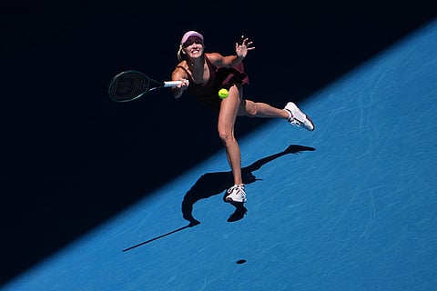 Anastasia Potapova of Austria plays a forehand return to Aryna Sabalenka of Belarus during their third round match at the Australian Open tennis championship in Melbourne, Australia.