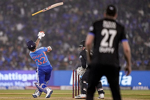 Indian batter Ishan Kishan's bat slips from his hand as he plays a shot during the second T20I cricket match between India and New Zealand, at Shaheed Veer Narayan Singh International Cricket Stadium, in Raipur, Chhattisgarh.