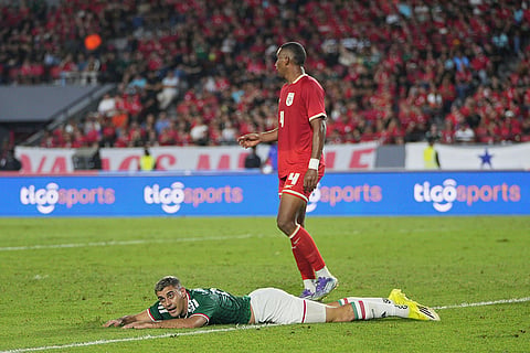 Mexico's Germán Berterame reacts after missing a chance to score against Panama during an international friendly soccer match in Panama City.