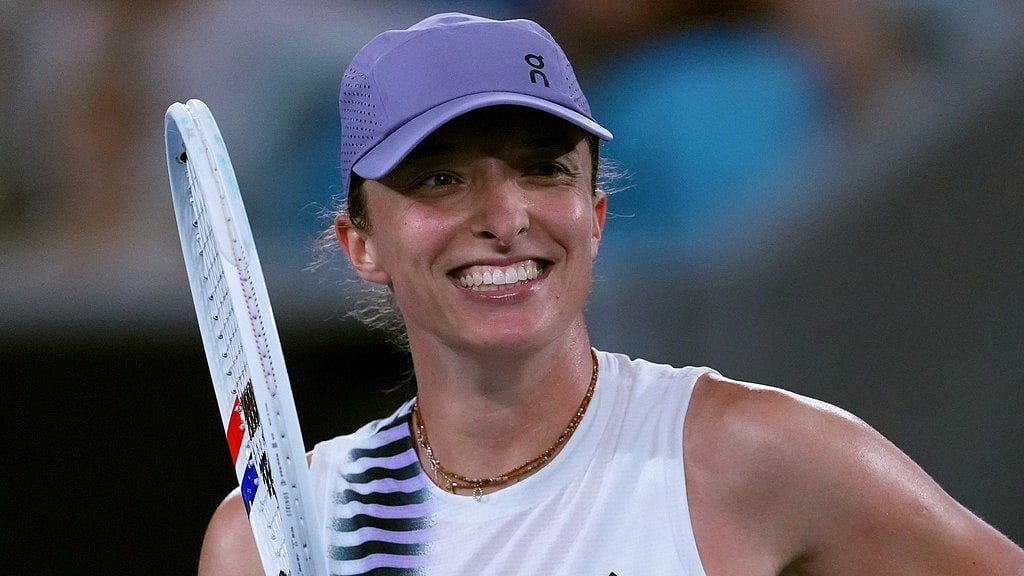 Photo: AP : Iga Swiatek of Poland reacts after defeating Anna Kalinskaya of Russia in their third round match at the Australian Open tennis championship in Melbourne.