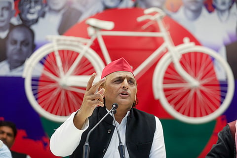Samajwadi Party President Akhilesh Yadav addresses a press conference at the party office, in Lucknow.