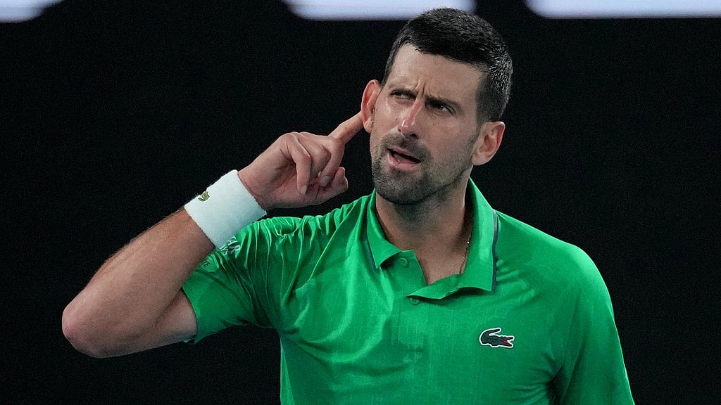 Photo: AP : Novak Djokovic of Serbia reacts after defeating Botic van de Zandschulp of the Netherlands in their third round match at the Australian Open tennis championship in Melbourne.